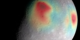 A gravity map of Mercury shows mass concentrations (red) centered on the Caloris basin (center) and the Sobkou region (right limb).