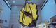 Part 2 of engineers at Goddard Space Flight Center moving the James Webb Space Telescope onto the rollover fixture, and then rotating and tilting the telescope inside the cleanroom.    