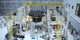 4K B-roll footage of the 18th golden mirror being installed to the backplane structure of the Webb Telescope.  